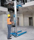 Material lift holding metal pipe
